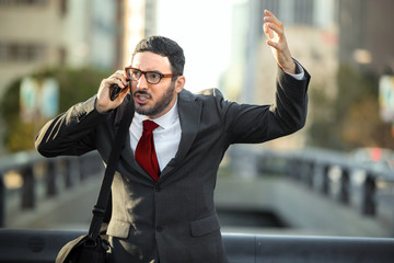 Stress panic fiery enraged business executive shouting angry on phone