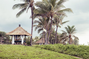 Fototapeta na wymiar Tropical Paradise. Relaxing on remote beach. Vintage.