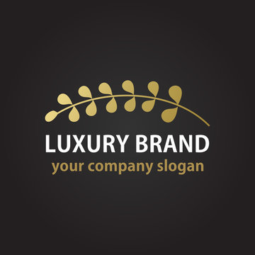 Gold logo sign with a laurel branch