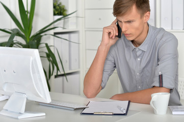 young businessman with computer