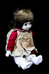 Close Up and Isolated Vintage Antique Old Doll