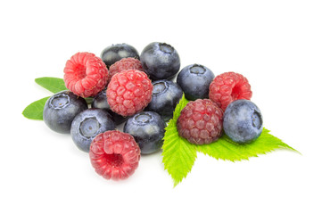 Blueberry and raspberries on white background