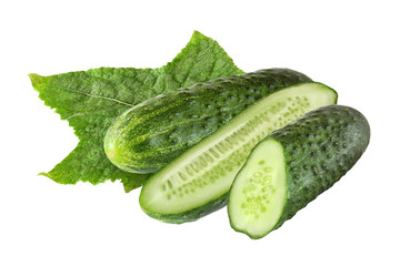 whole and sliced cucumbers with leaf isolated on white backgroun