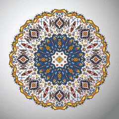 Ornamental round colorful geometric pattern in aztec style