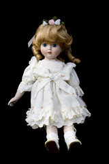 Close Up and Isolated Vintage Antique Old Doll