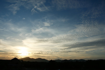 Sunset over the mountain .