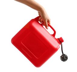 Fototapeta premium Hand holding jerrycan isolated on white