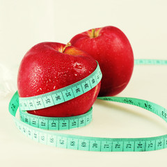 two apples, measurement and water