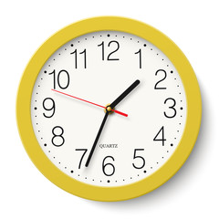 Classic round wall clock in yellow body isolated on white