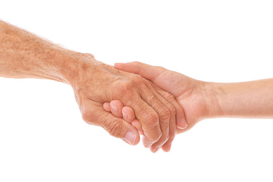 Old Male And Young Female Hands On White Background