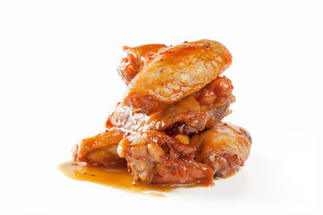 Fried chicken wings isolated on white