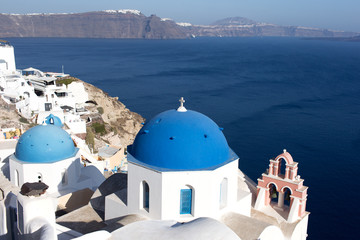 Fototapeta na wymiar Santorini Island - view of the white city and the blue sea