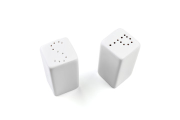white salt and pepper shakers isolated