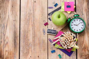 Business accessories, supplies, mug with pencils on rustic wooden table