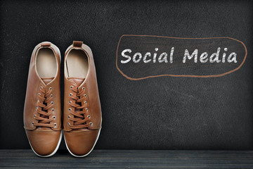 Social Media text on black board