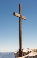 Wooden summit cross in the alps