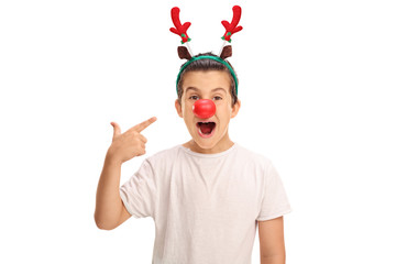 Boy posing with reindeer ears and nose