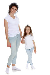 Mom and daughter in jeans  white shirts