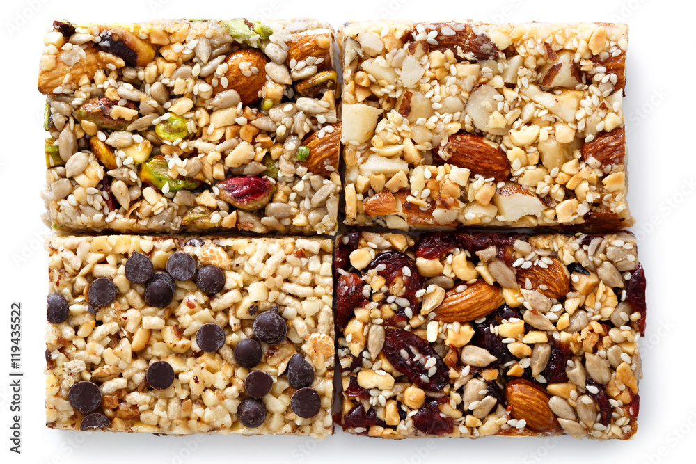 Poster four fruit, nut and seed bars with pistachios, cranberries, brazil nuts and chocolate chips.