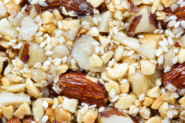 Background of nut and seed bar with Brazil nuts.