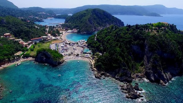 Flight Over Paleokastritsa Bay Greece Corfu Aerial 4k Travel Video. Resort, Ocean Sea Coast, Clean Blue Water 