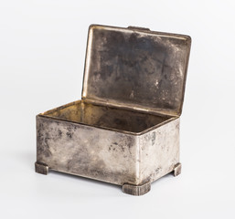 Old silver metallic retro casket over white background