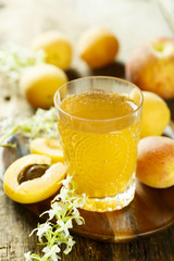 Fototapeta premium Glass of peach and apricot drink