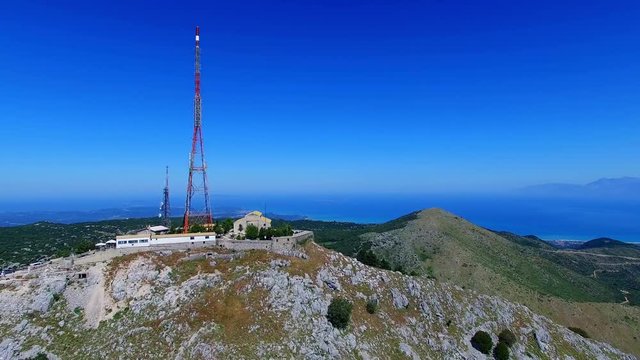 Mount Pantokrator Corfu top mountain summit Greece aerial 4k video. Peak communications technology station.