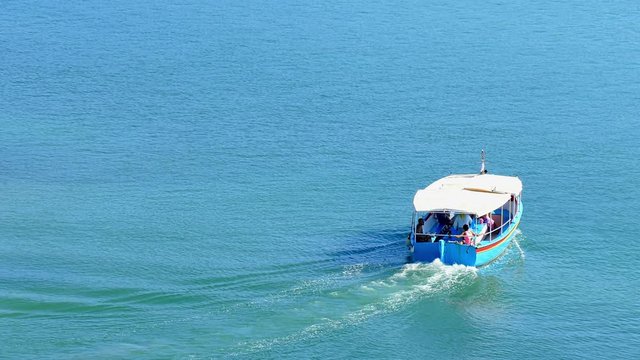 Passanger motor boat ship salling on water travel 4k video. Pleasure craft on blue sea, ocean, lake, river