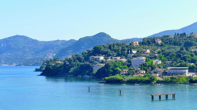 Greece Corfu island sea coast 4k travel video. View from Kanoni and water gulf of houses on hills