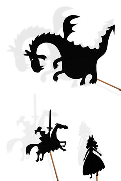 Shadow puppets of dragon, princess and knight on white background