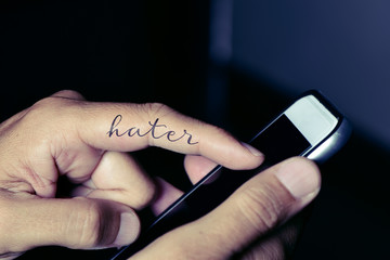 hater man using a smartphone