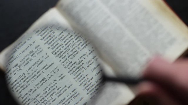 Looking through the English-Russian dictionary with a magnifying lens