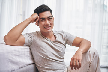 Portrait of Vietnamese young handsome man looking at camera