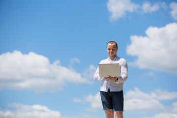 Man using his laptop computer