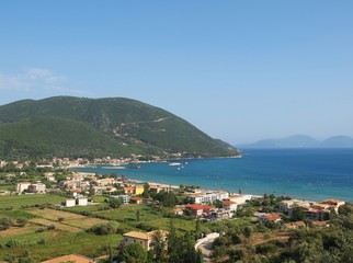 Naklejka na ściany i meble Aerial view of Vasiliki city and beach in Lefkada, Greece. 