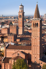Fototapeta na wymiar View of Verona with the church of St. Anastasia and the tower of Lamberti - Veneto, Italy