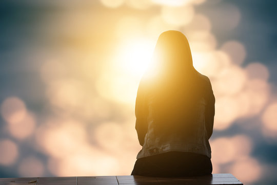 Lonely Woman Sitting Alone Moments Sunset.are Lovely. Style Abstract Shadows.silhouette. On Blurred Background Bokeh. Light Fair