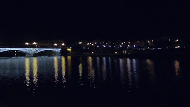 Night river in Sevilla