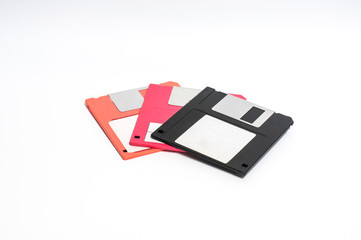 Old floppy disk put on white background,soft focus.
