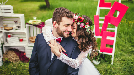 Wedding couple embracing each other