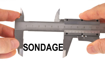 Mesure du sondage avec un pied à coulisse