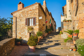 Fototapeta na wymiar Tipical Old Italian town - narrow street with flowers