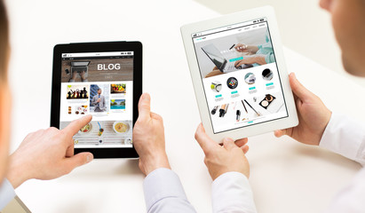 close up of businessman hands with tablet pc