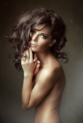 Fototapeta premium Long curly Hair. Sensual woman Portrait.