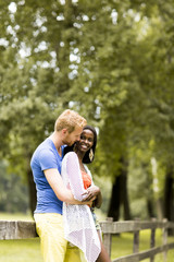 Loving couple by tge fence