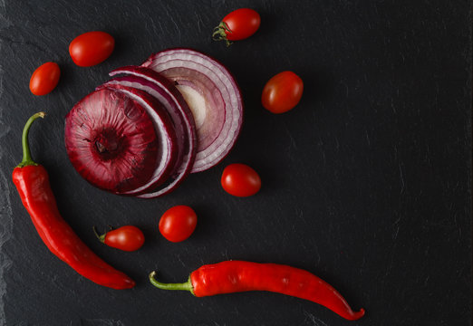 Cut sliked onion on a kitchen board