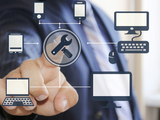 Businessman pressing the technical support button on virtual touch screens. Repair and maintenance...