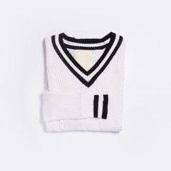 White knitted sweater top view