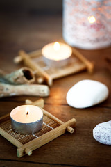 Spa background with candles and treatment products